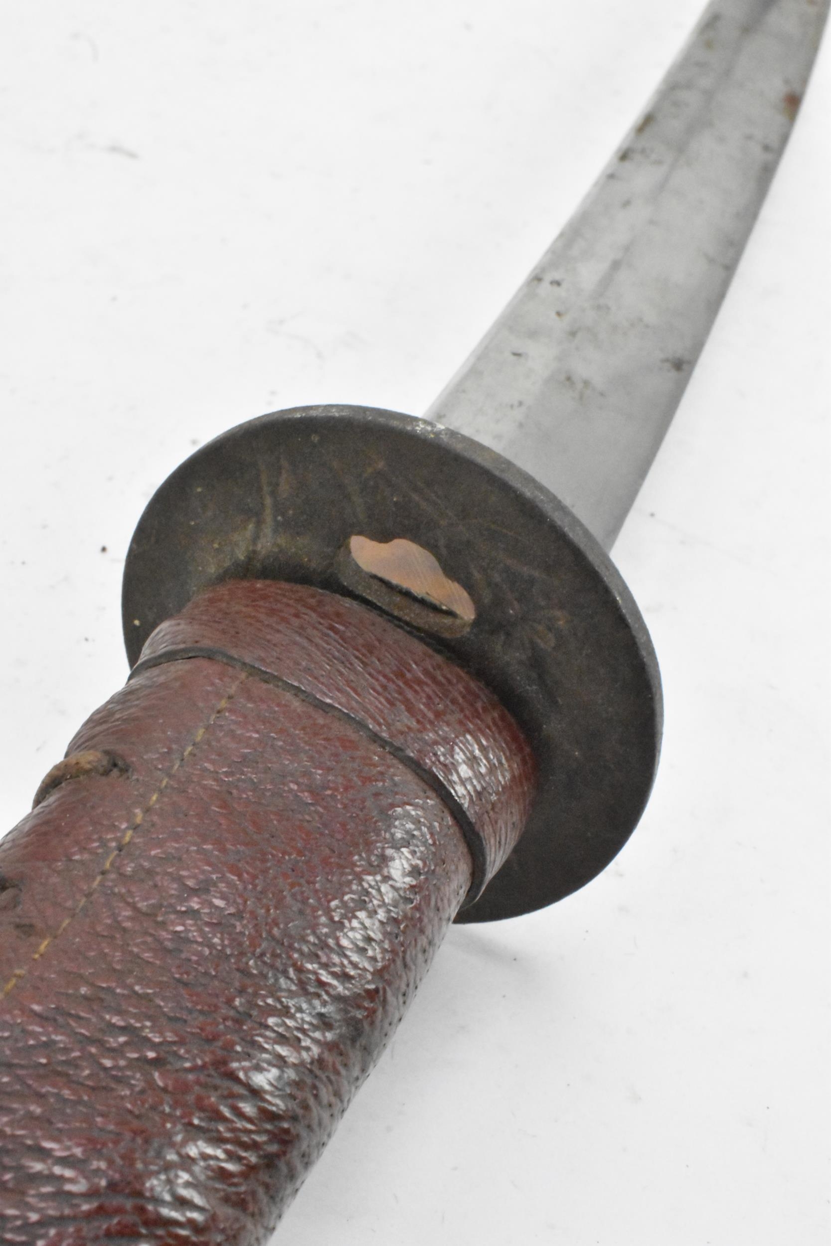 A WWII Japanese officers Katana sword and scabbard, both bound in red leather, steel blade, - Image 3 of 14