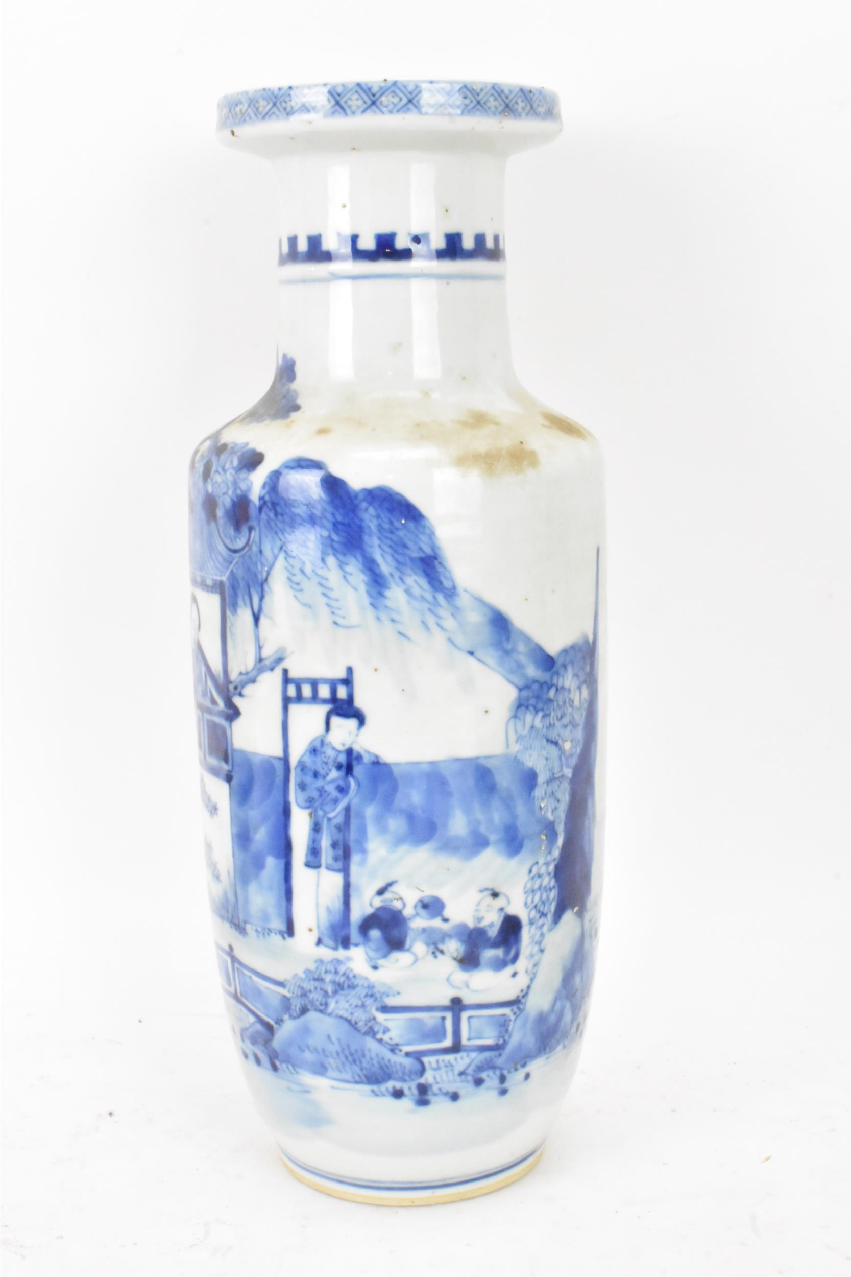 A Chinese late Qing dynasty blue and white rouleau vase, late 19th/early 20th century, decorated - Image 2 of 6