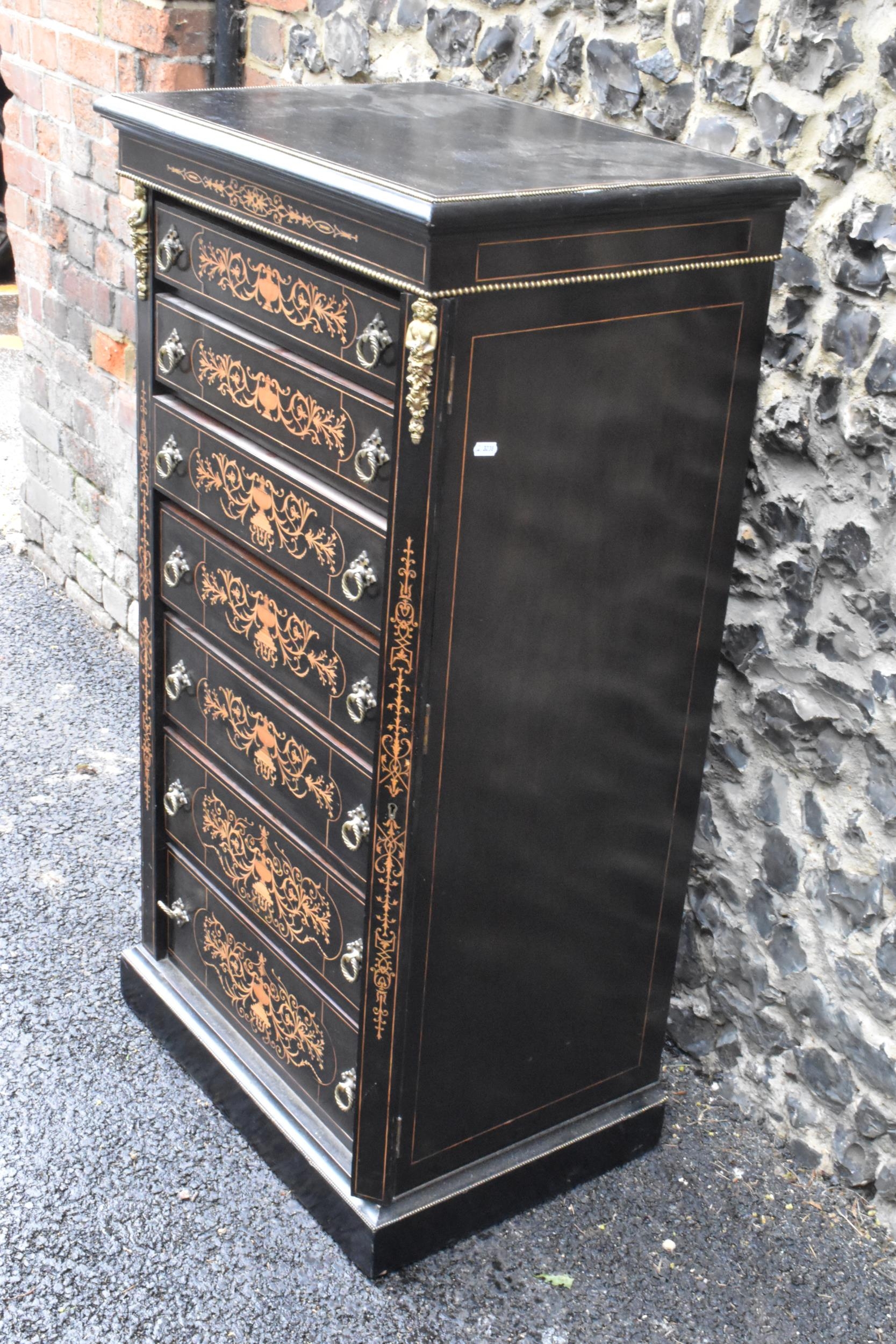 A late Victorian ebonised wellington chest of seven graduating drawers, applied gilt beading and - Image 3 of 6
