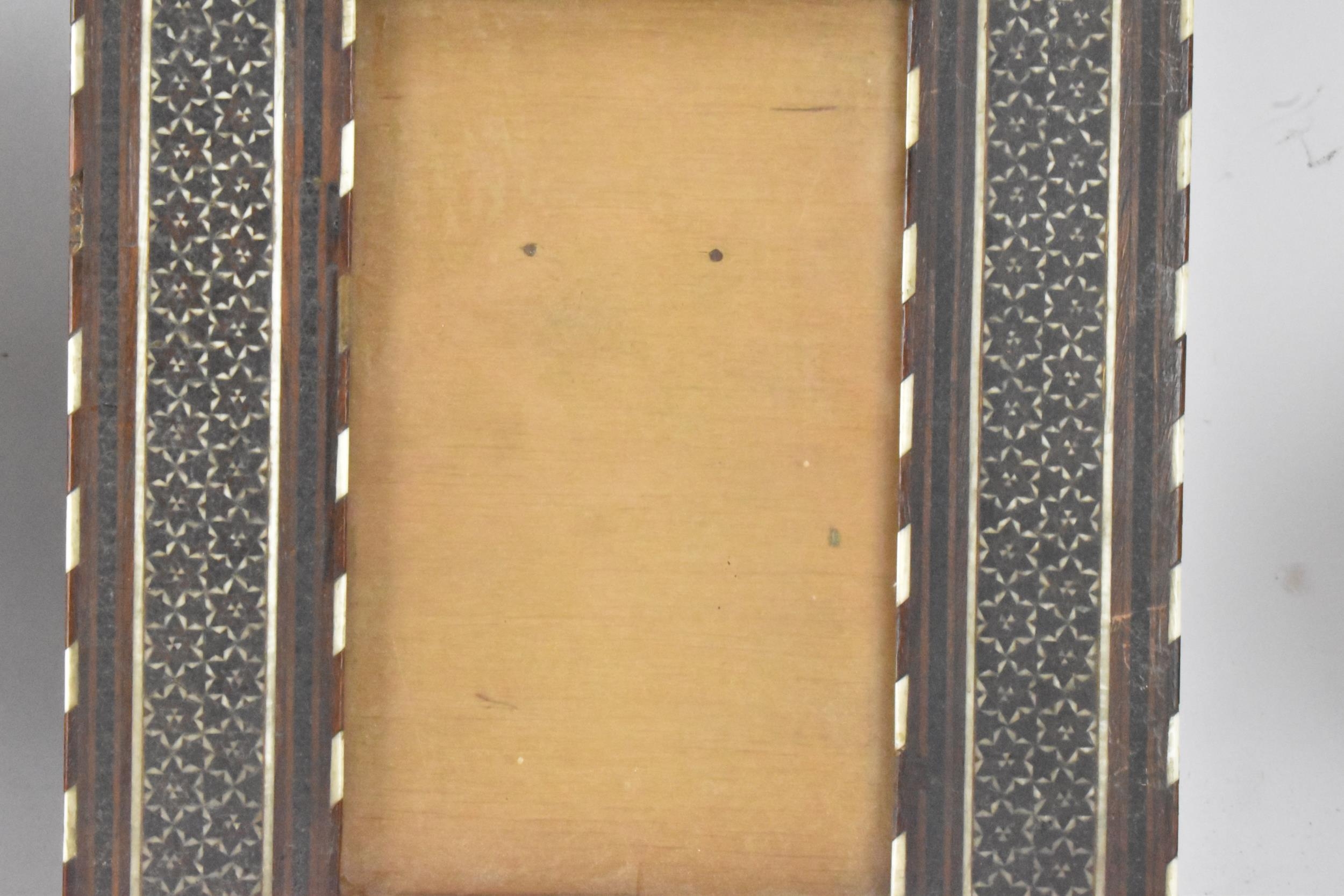 Three similar Persian late Qajar dynasty photograph frames, the profusely inlaid frames having - Image 4 of 14