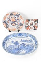 A Chinese export, 18th century, Qianlong period blue and white oval formed dish, decorated with a