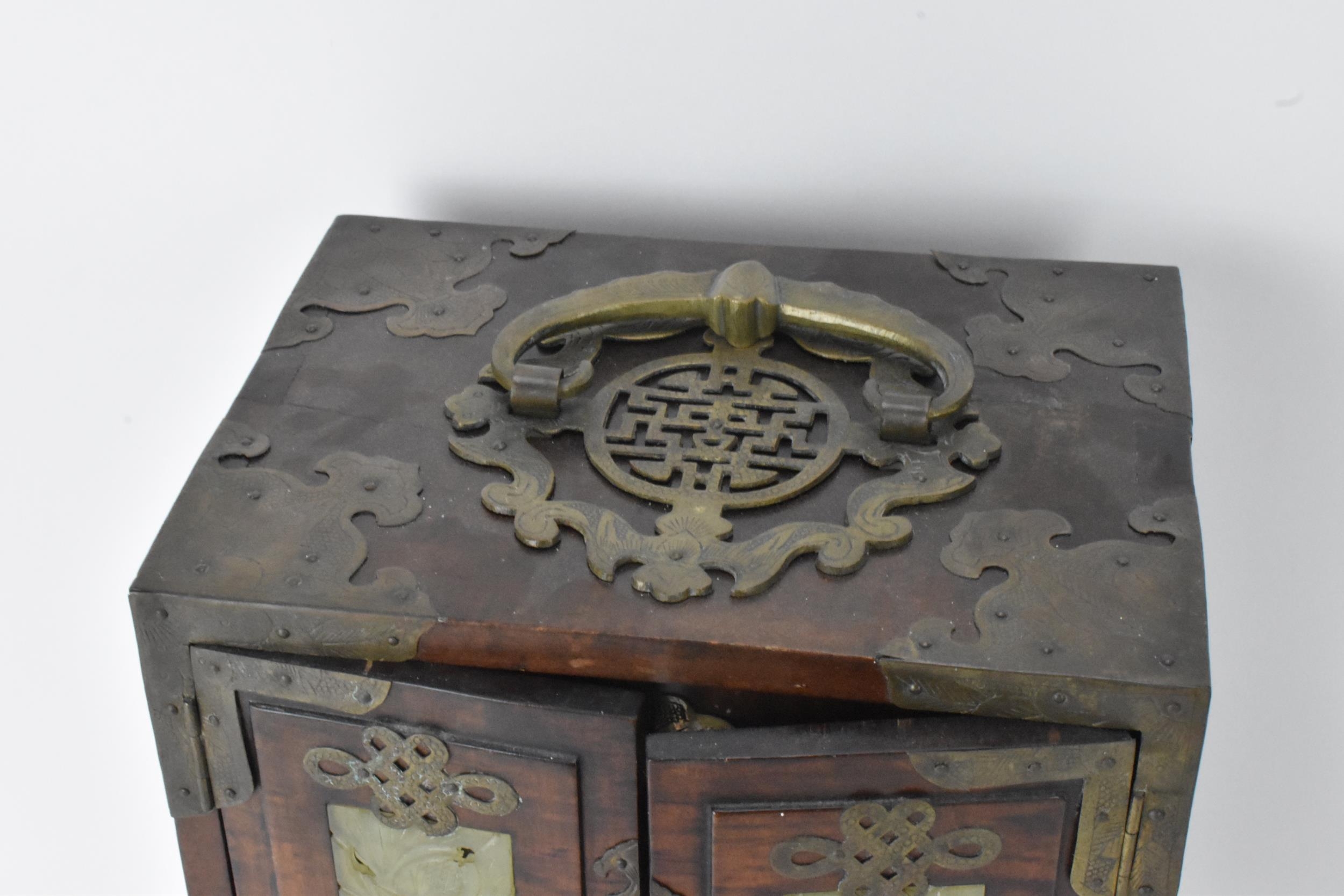 A Chinese 20th century hardwood and jade panelled jewellery cabinet box, the cabinet having twin - Image 2 of 5