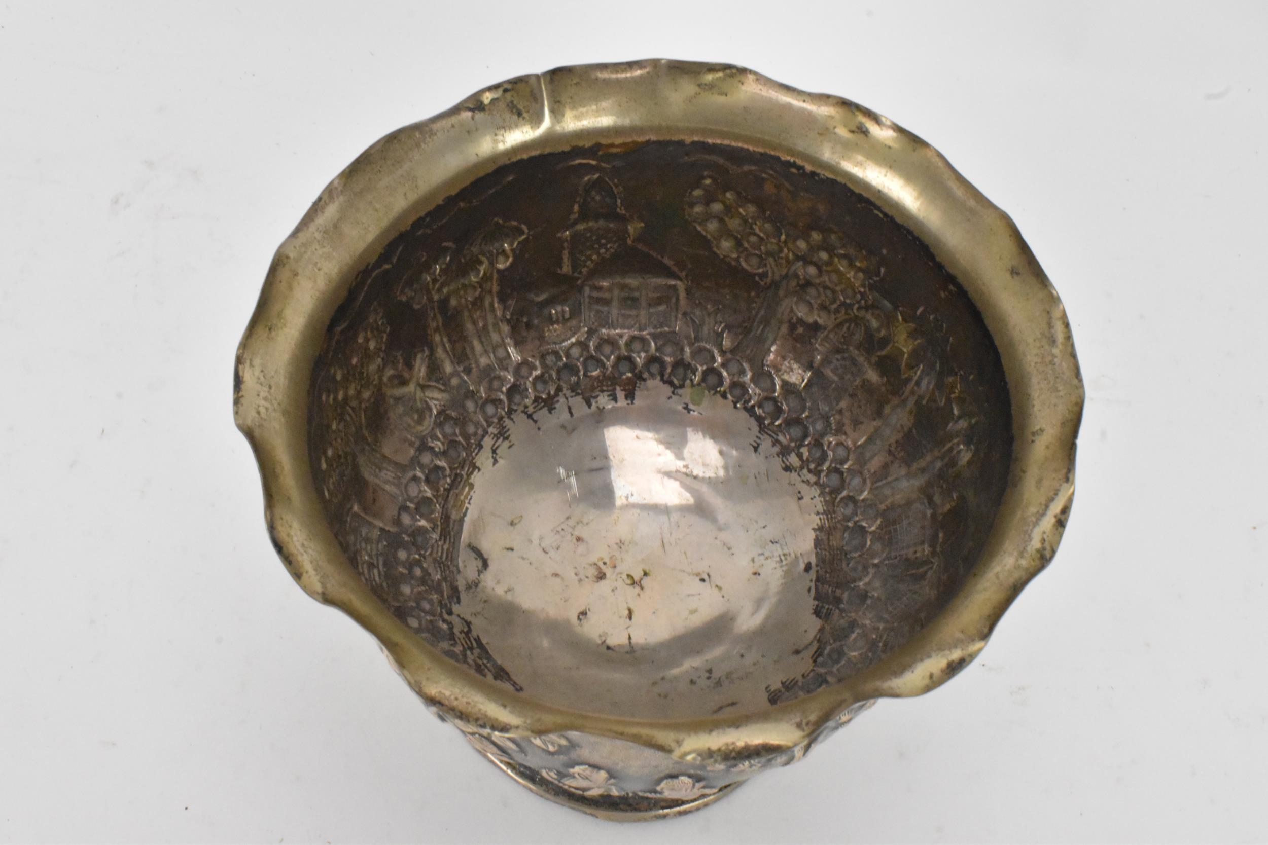 An early 20th century Anglo-Indian white metal bowl, having a crimped rim and embossed decoration - Image 5 of 6