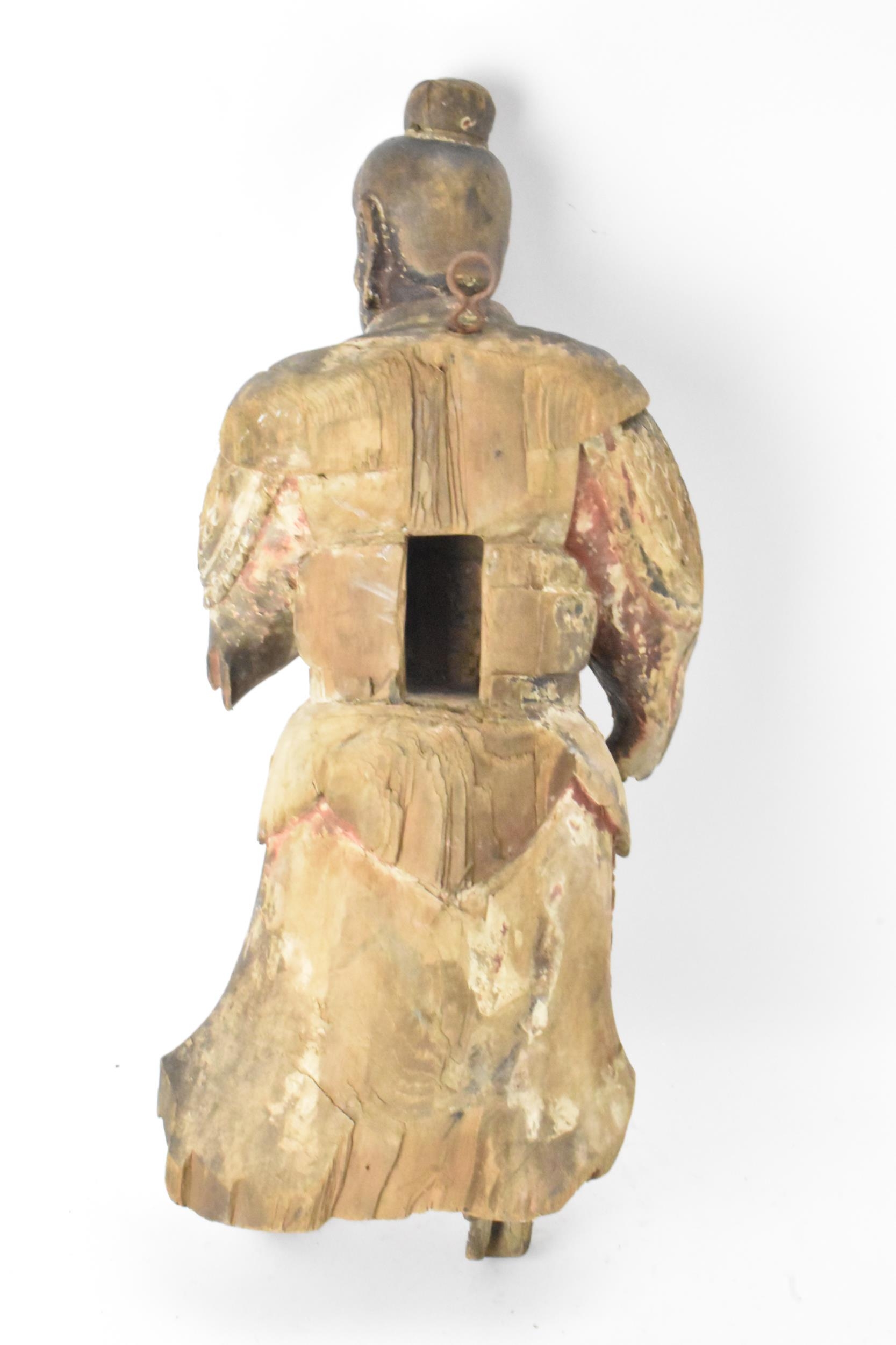 A Chinese carved and painted wood figure of a warrior, late Ming/Qing dynasty, in traditional - Image 3 of 8