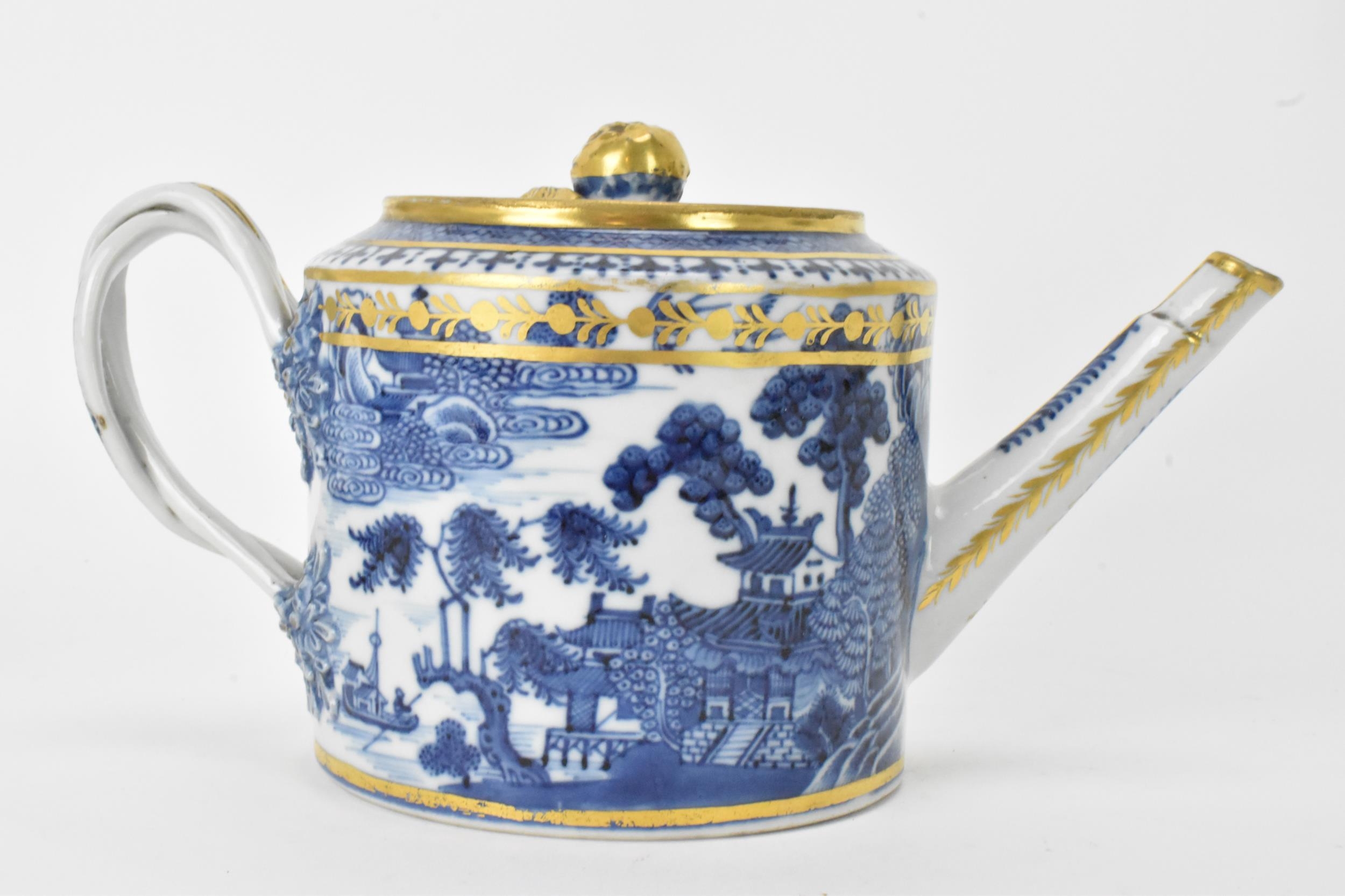 A Chinese export Qing dynasty blue and white teapot and stand, late 18th century, decorated with - Image 3 of 11