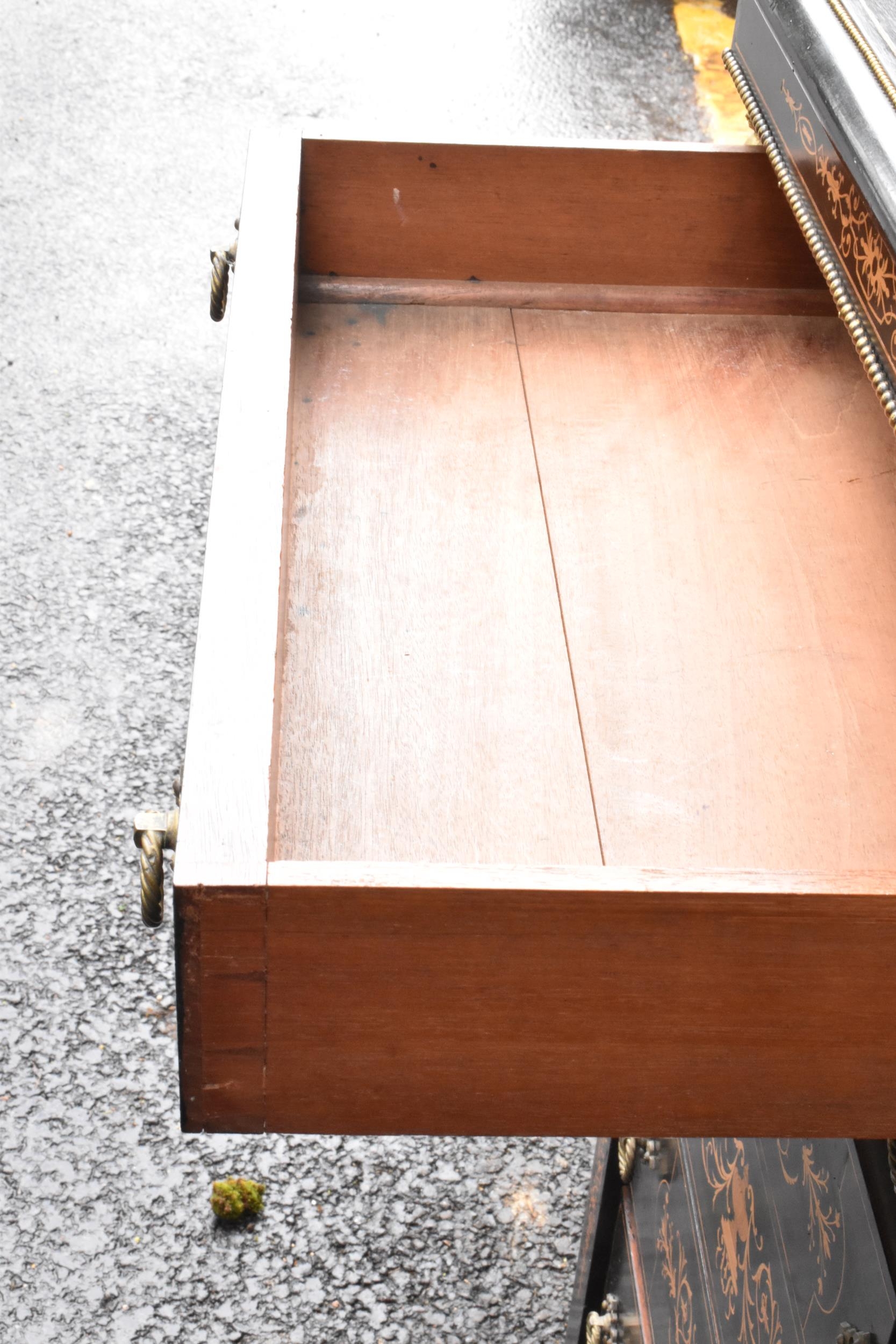 A late Victorian ebonised wellington chest of seven graduating drawers, applied gilt beading and - Image 4 of 6