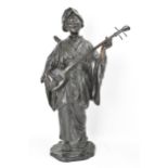 A Japanese Meiji period bronze figure of a bijin musician, wearing a kimono and playing a shamisen