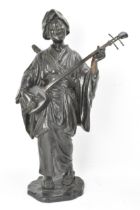 A Japanese Meiji period bronze figure of a bijin musician, wearing a kimono and playing a shamisen