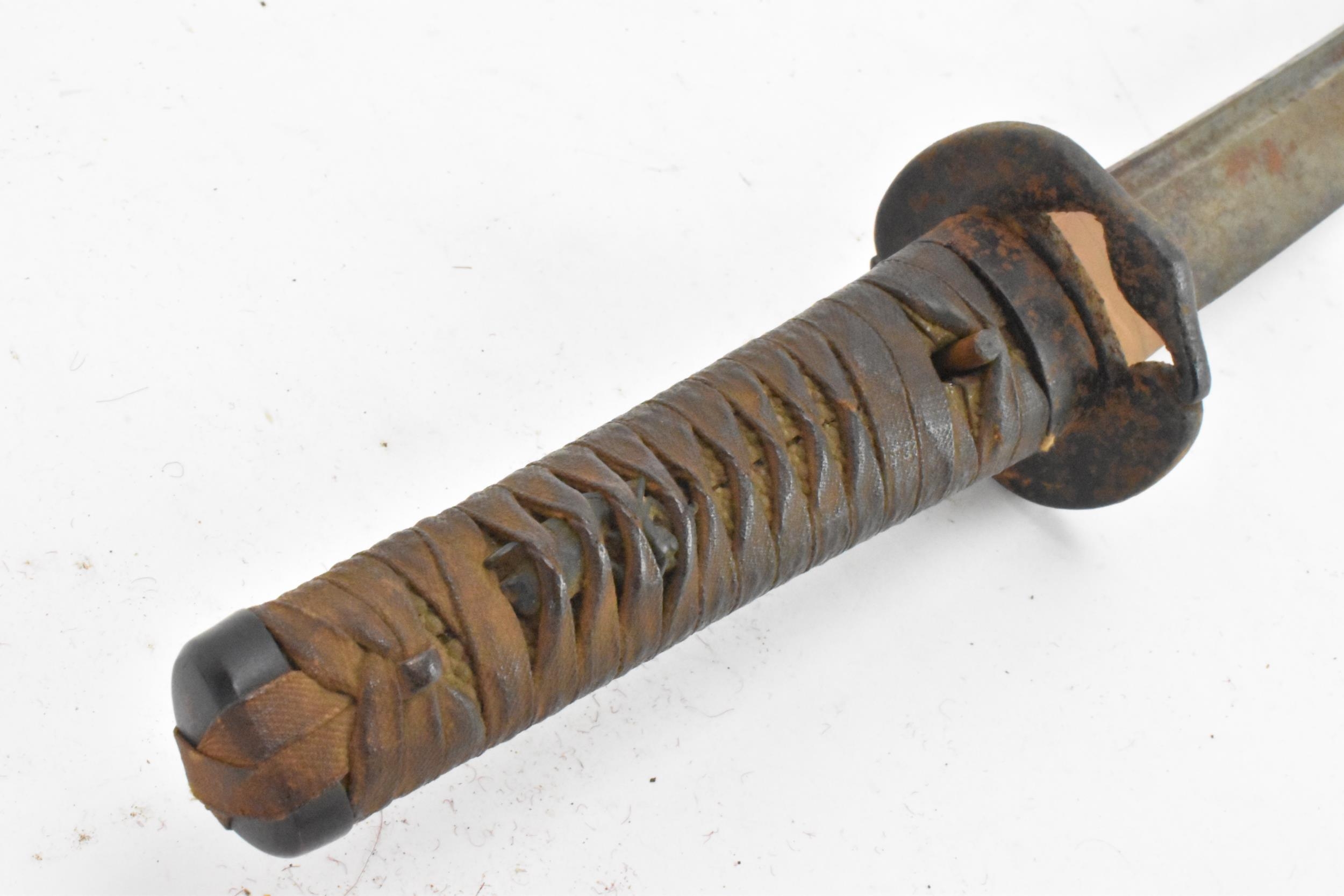 A Japanese wakizashi sword, steel blade, pierced tsuba, brown braid bound tsuka, shagreen handle, - Image 3 of 5