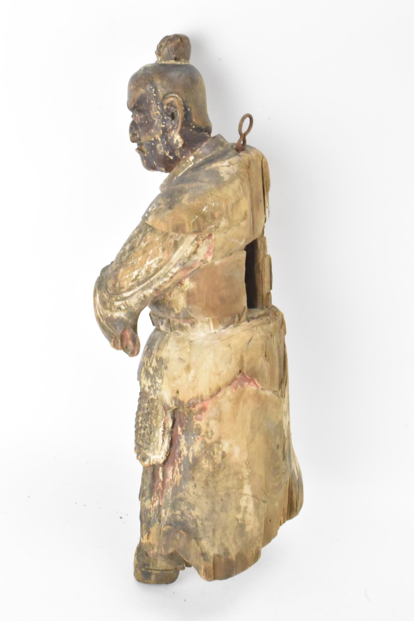 A Chinese carved and painted wood figure of a warrior, late Ming/Qing dynasty, in traditional - Image 2 of 8