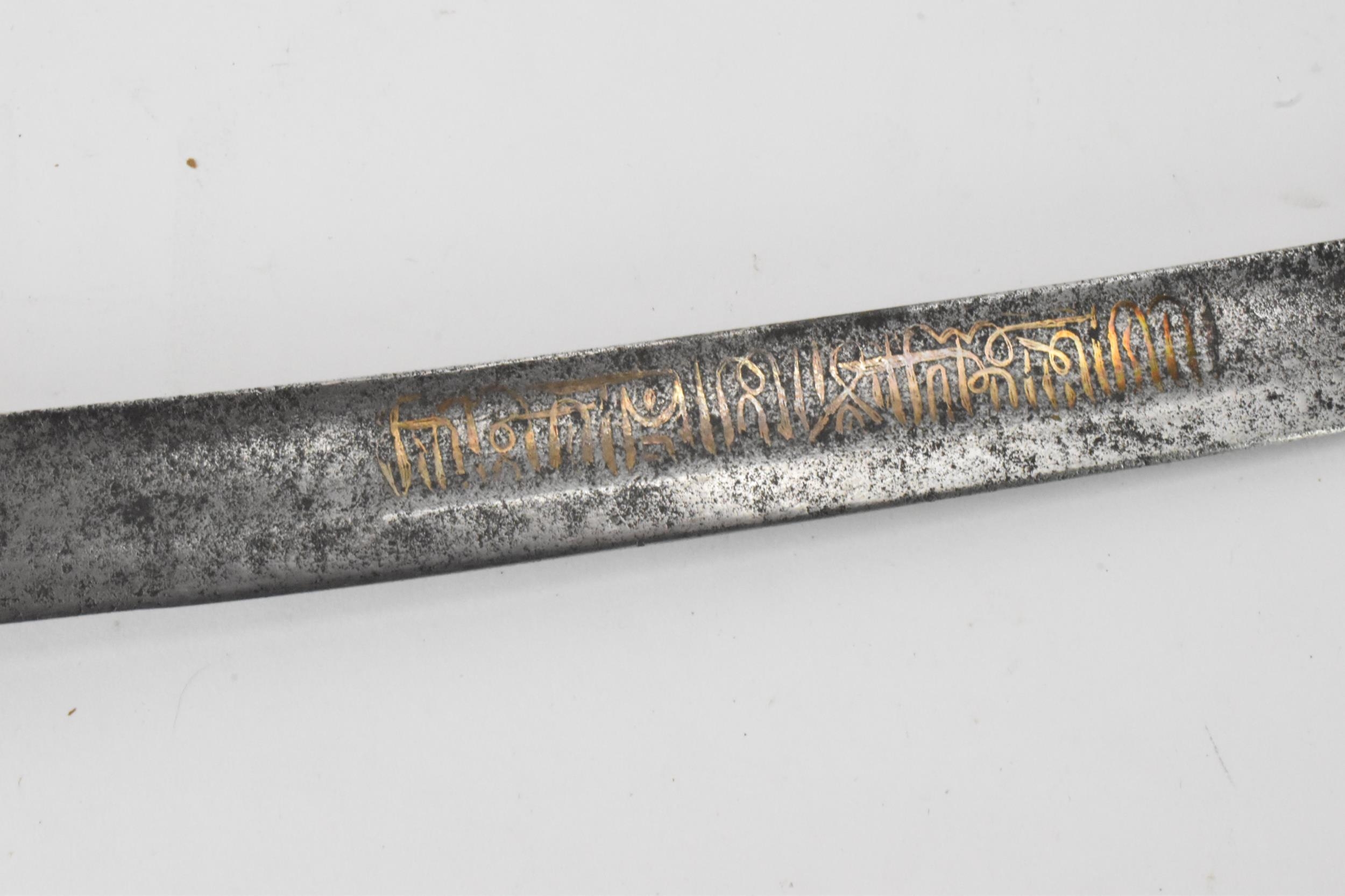 An Ottoman Empire shamshir sword, having a curved blade with gilt calligraphy, characteristic gilt - Image 7 of 16