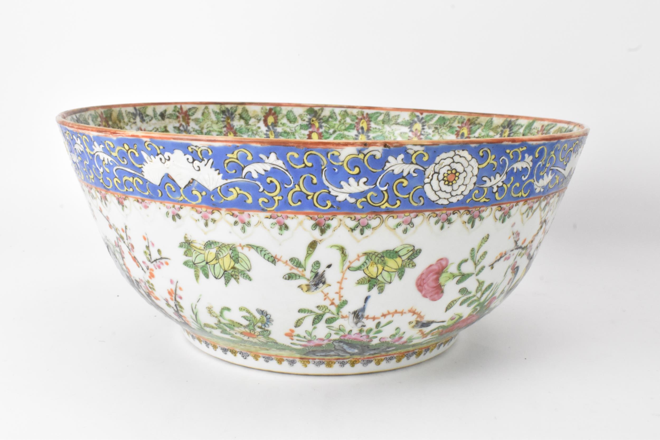 A near pair of Chinese export Canton famille rose punch bowls, Qing dynasty, late 19th century, - Image 4 of 15