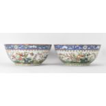 A near pair of Chinese export Canton famille rose punch bowls, Qing dynasty, late 19th century,