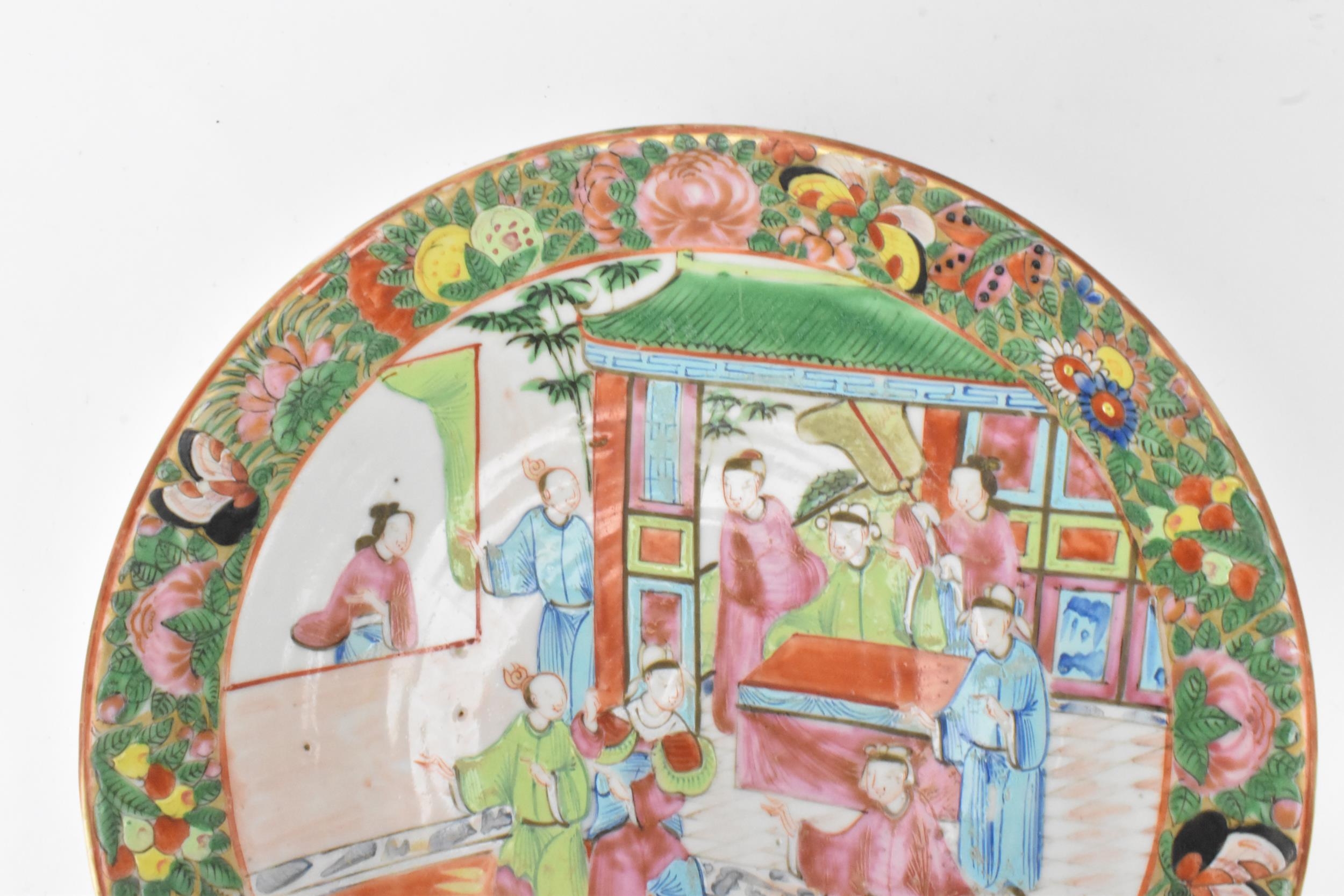 A pair of Chinese export Canton Famille Rose plates, Qing Dynasty, late 19th century, each decorated - Image 2 of 9