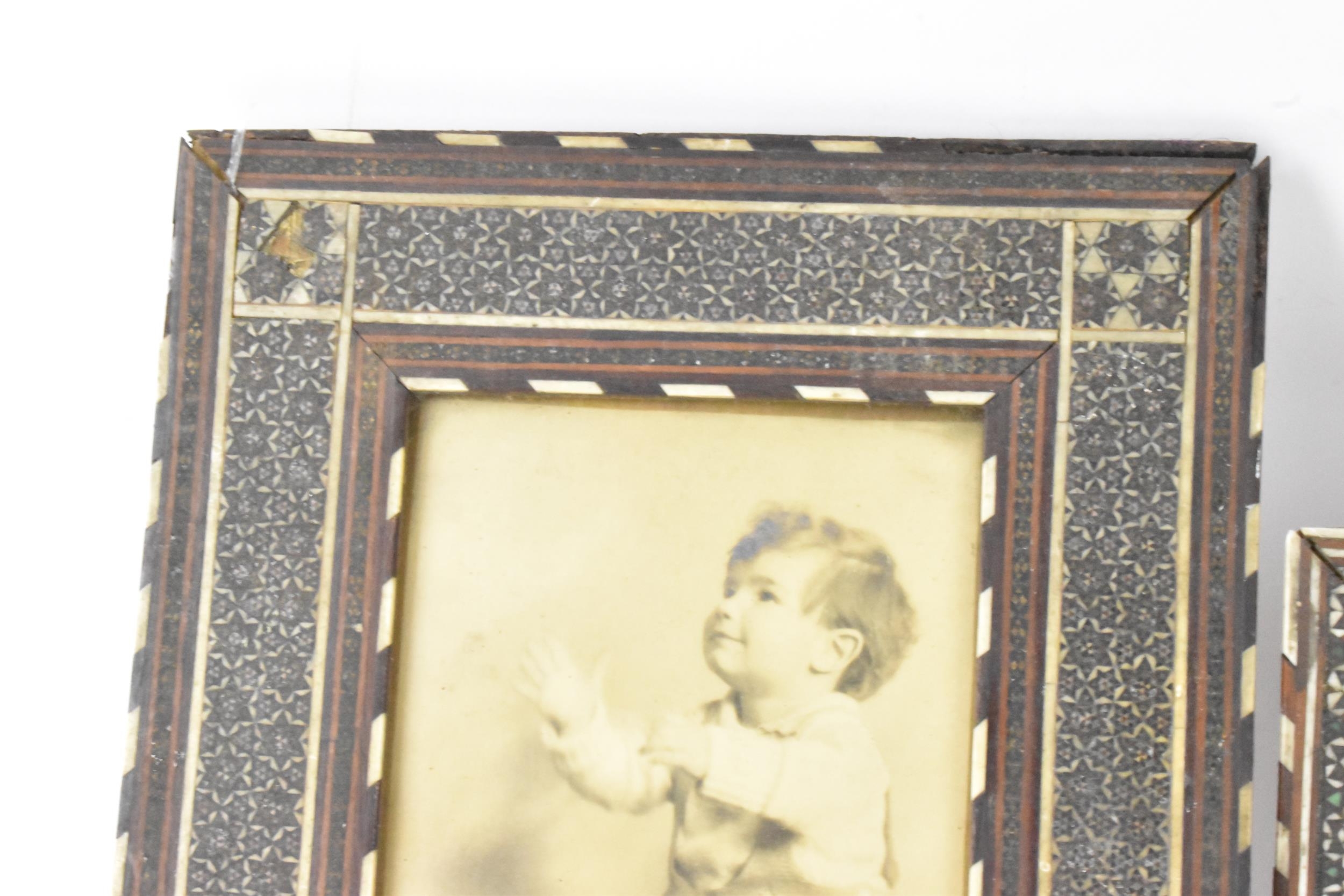 Three similar Persian late Qajar dynasty photograph frames, the profusely inlaid frames having - Image 11 of 14