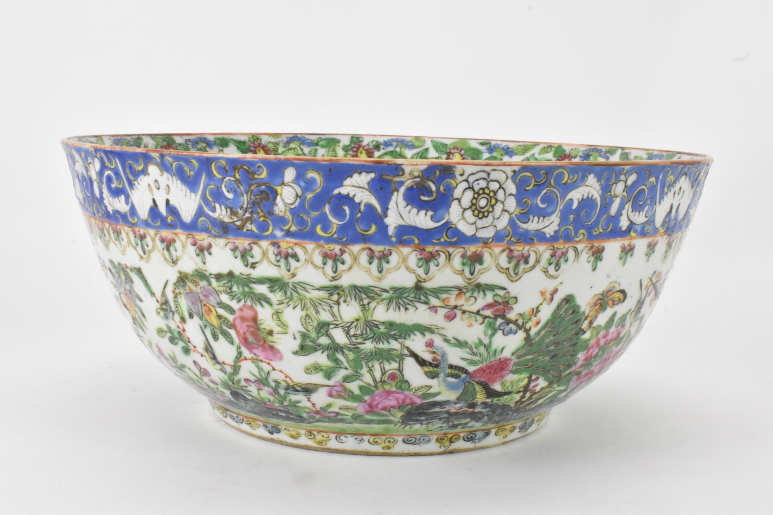 A near pair of Chinese export Canton famille rose punch bowls, Qing dynasty, late 19th century, - Image 11 of 15