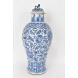 A Chinese Qing dynasty blue and white lidded vase, late 19th century, baluster shape with Xuande