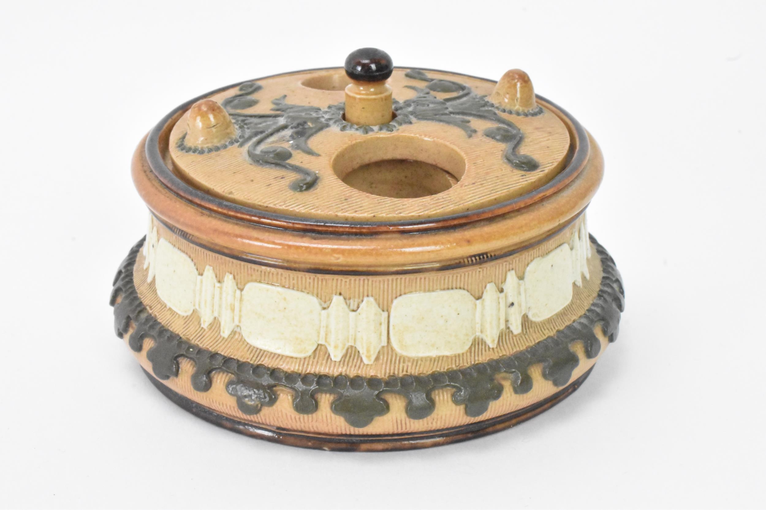 A rare and unusual Doulton stoneware container, possibly an inkwell with revolving lid, the well - Image 3 of 10