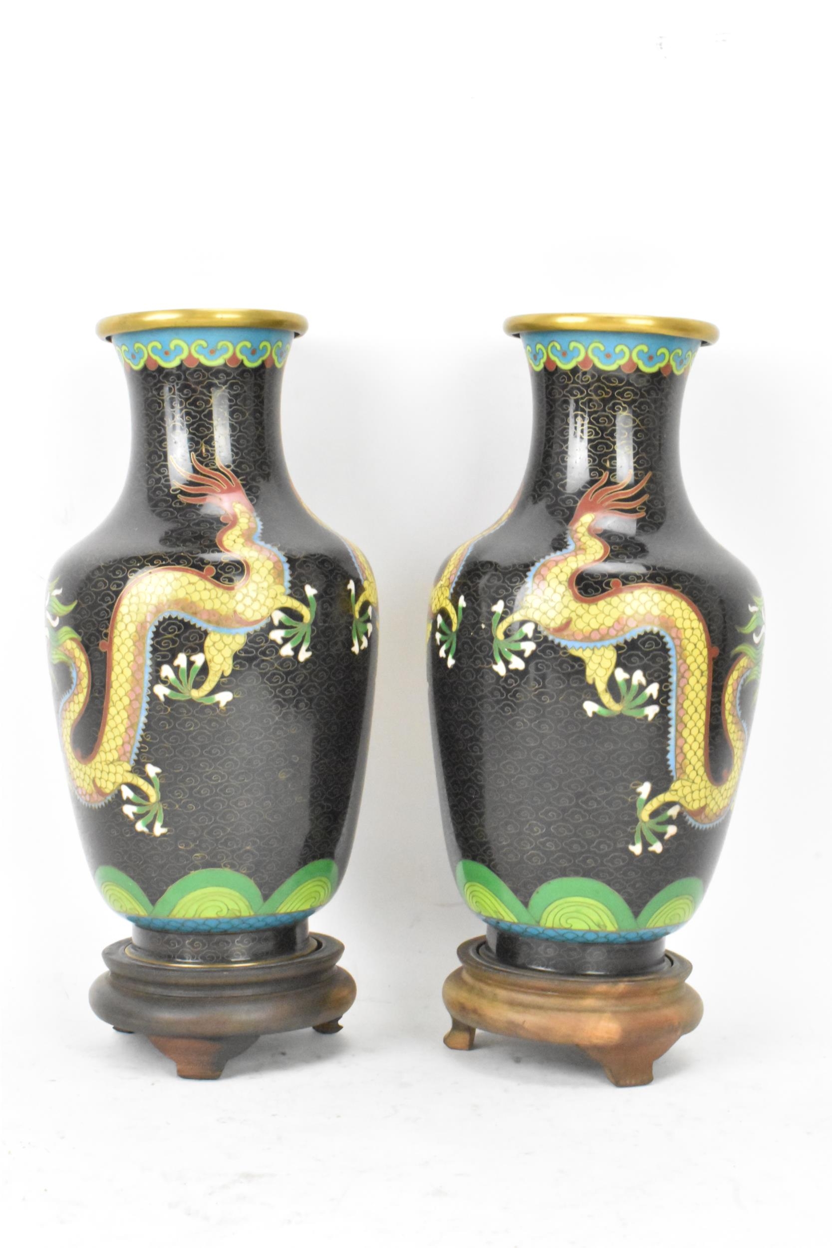 A pair of Chinese mid 20th century cloisonne vases, with black grounds decorated with confronting - Image 3 of 6