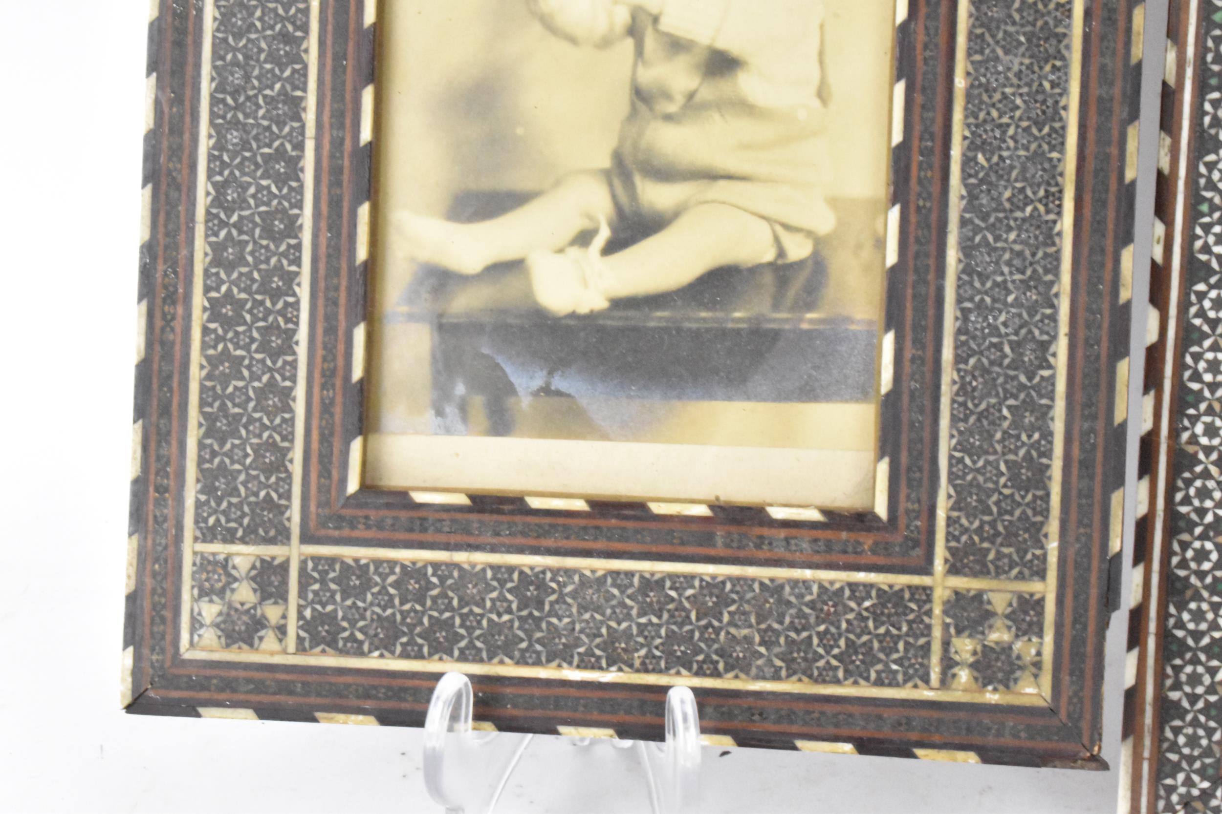 Three similar Persian late Qajar dynasty photograph frames, the profusely inlaid frames having - Image 13 of 14