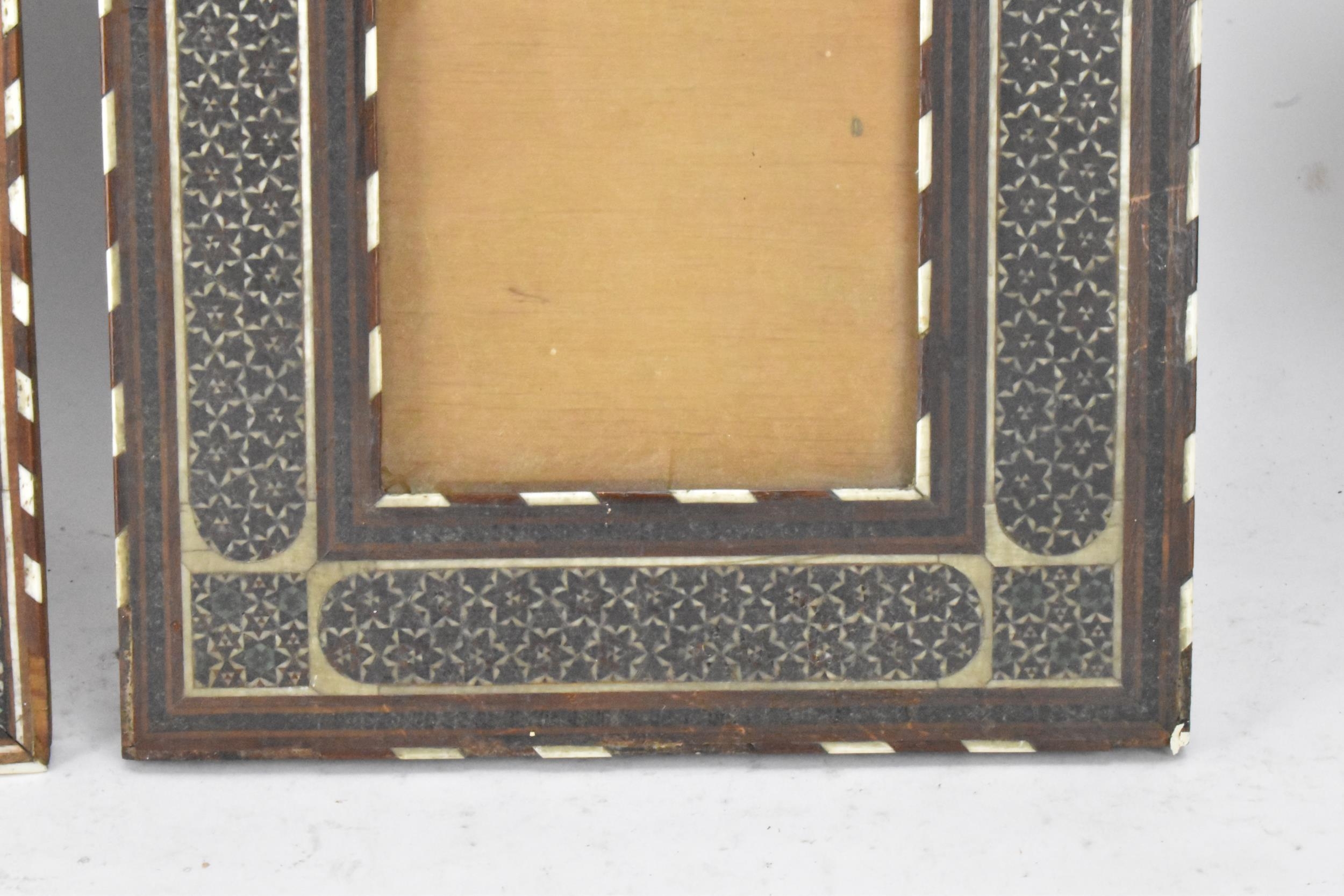 Three similar Persian late Qajar dynasty photograph frames, the profusely inlaid frames having - Image 5 of 14