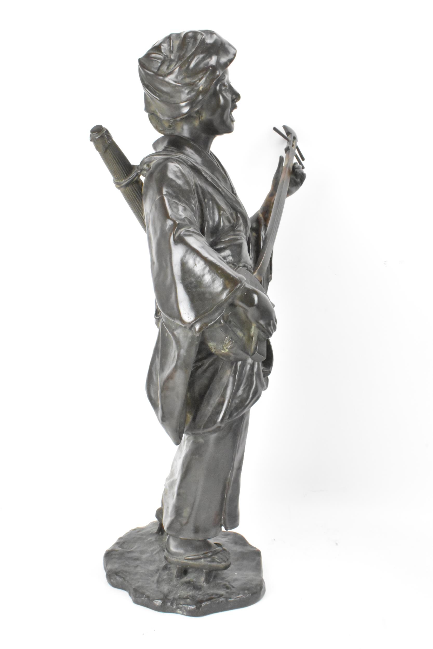 A Japanese Meiji period bronze figure of a bijin musician, wearing a kimono and playing a shamisen - Image 4 of 6