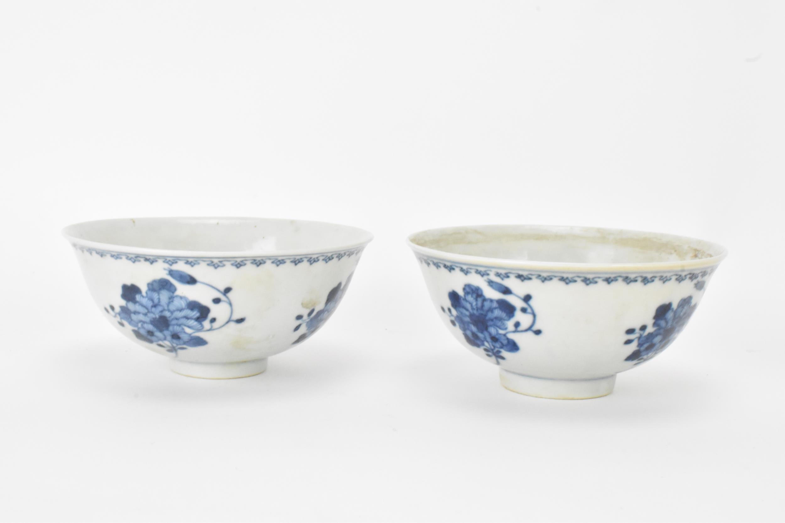 A set of four Qing dynasty, Guangxu period blue and white porcelain bowls, with floral decoration, - Image 9 of 9