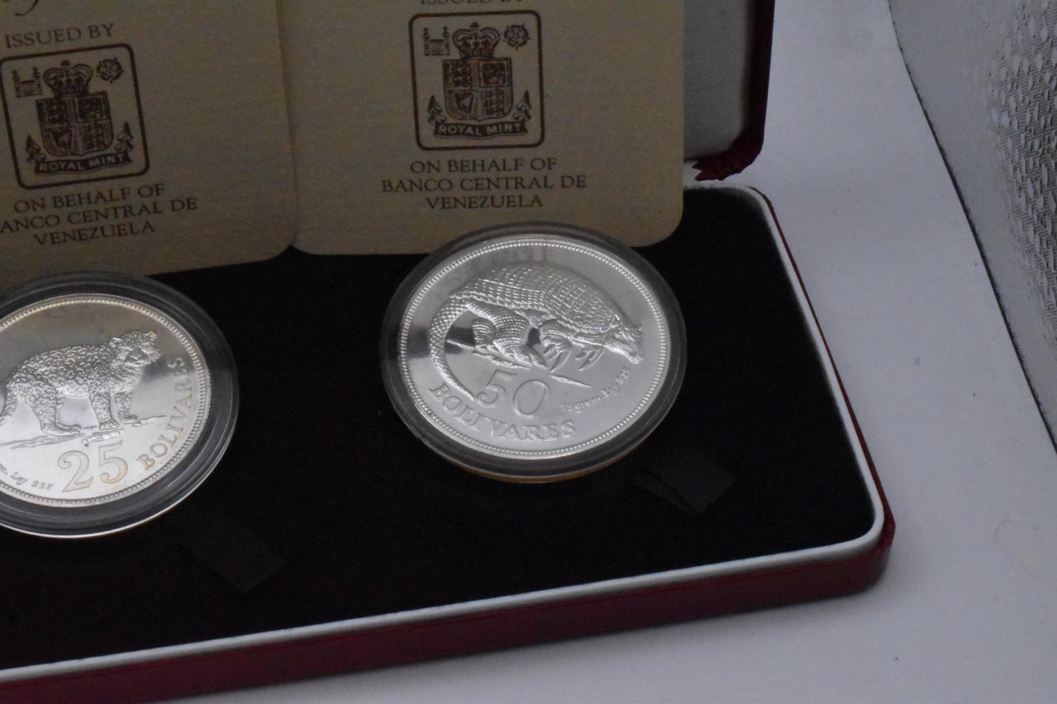 Royal Mint - A pair of cased Two-Coin Silver commemoratives to include Venezuela 50 and 25 - Image 2 of 3