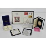 A mixed Collection of commemorative coins to include, Papua New Guinea Silver Jubilee Coin Cover,