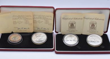 Royal Mint - A pair of cased Two-Coin Silver commemoratives to include Venezuela 50 and 25