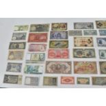 Banknotes - A collection of 19th Century and later banknotes from around the world to include,