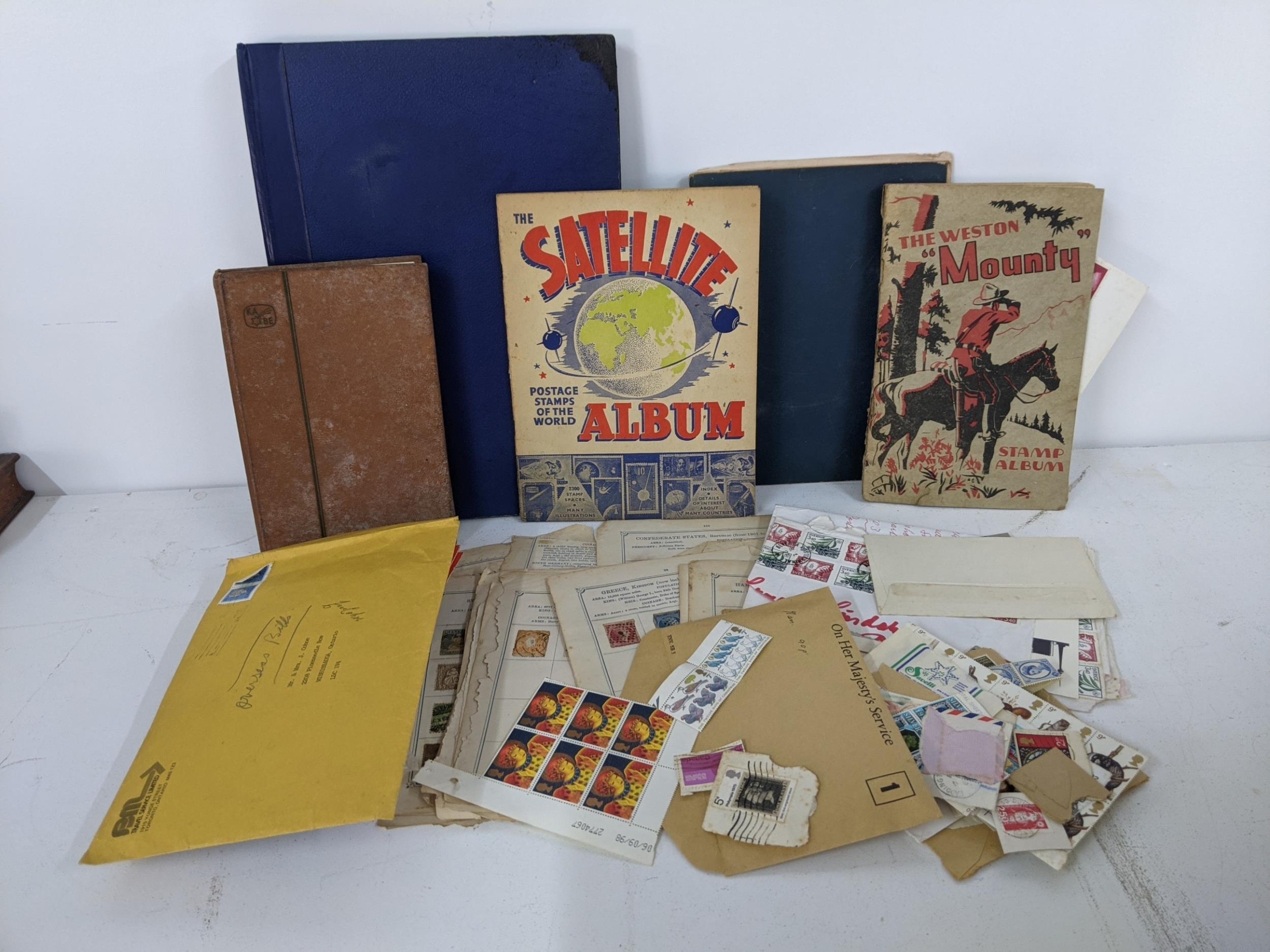 Five stamp albums to include some loose, to include examples from Czechoslovakia, Mongolia, India,