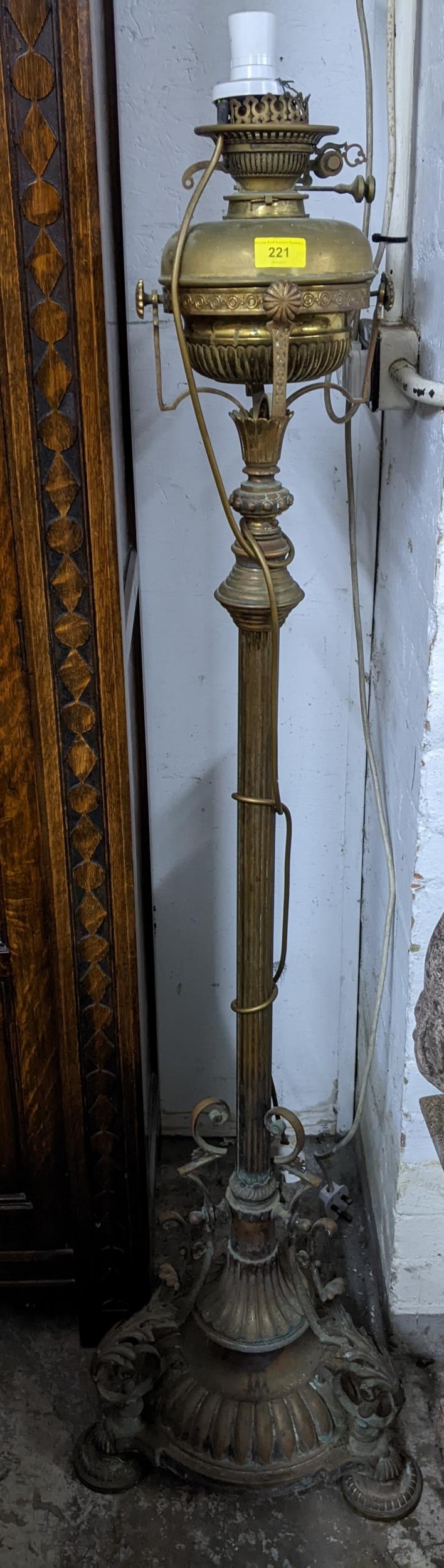 A Victorian gilt brass floor standing oil lamp Location: