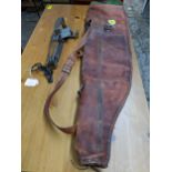 A leather gun case slip and a Sideboatham gamekeepers gin trap, Catalogue note:- the gin tray is