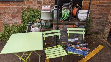 Garden related items and tools to include plant pots, weed control fabric string, markers, a