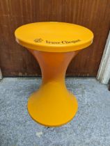 A Veuve Clicquot yellow label Tom Tom stool champagne ice cooler Location: If there is no