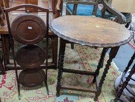 An early 20th century mahogany cake stand together with an oak occasional table Location: If there