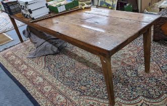 A 19th century French fruitwood large refractory dinning table, plant constructed and on square