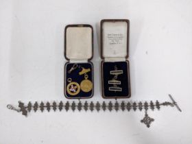 A 9ct gold Great Western railway first aid medal with a 9ct gold Great Western Railway 25 years