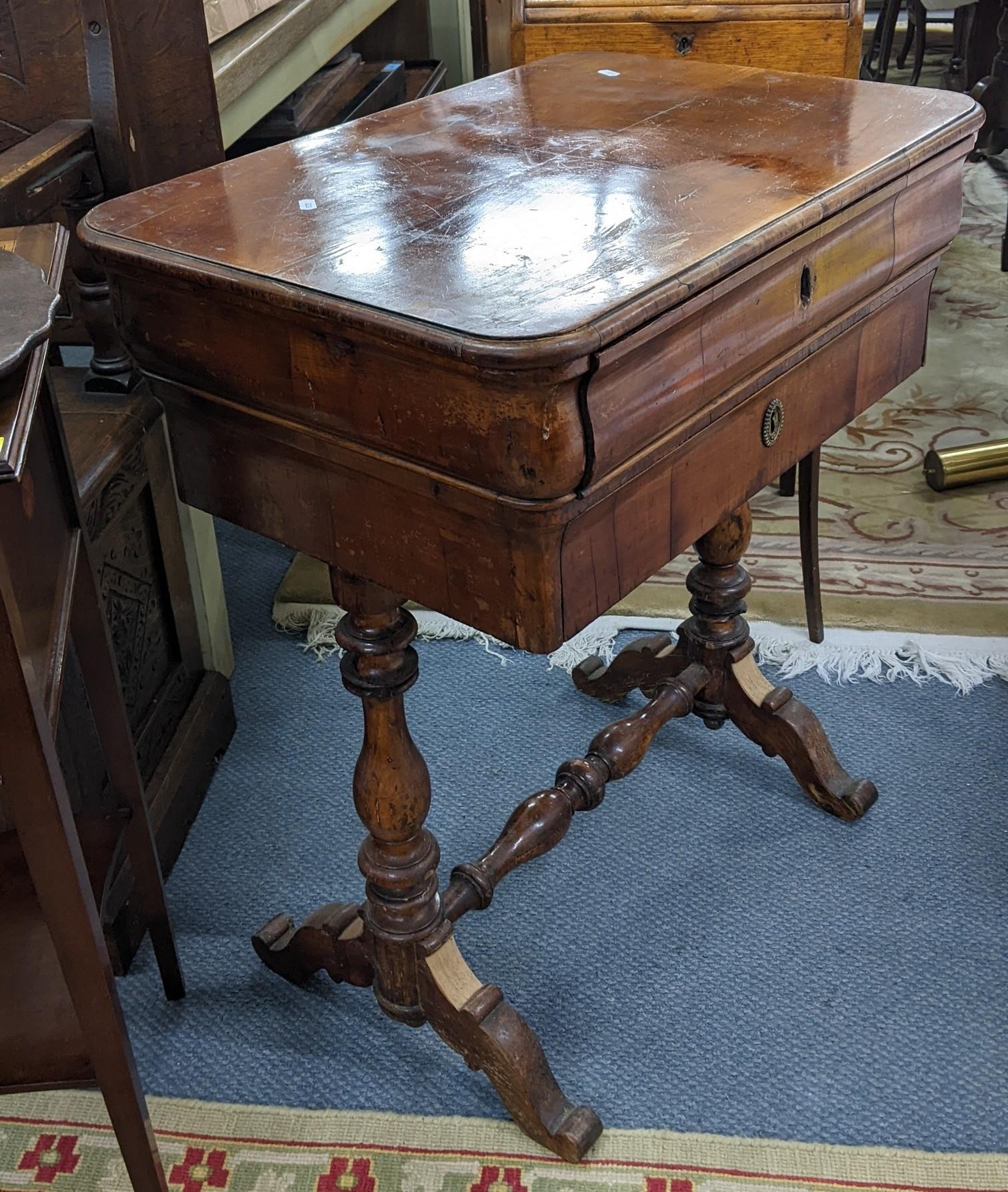 A 19th century French walnut work table having two drawers and turned supports, 79cm h x 68cm w - Image 2 of 2
