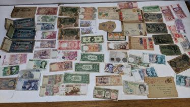 Banknotes and coins to include examples from Germany, Seden, Italy, Nigeria, Spain, Thailand, Isle