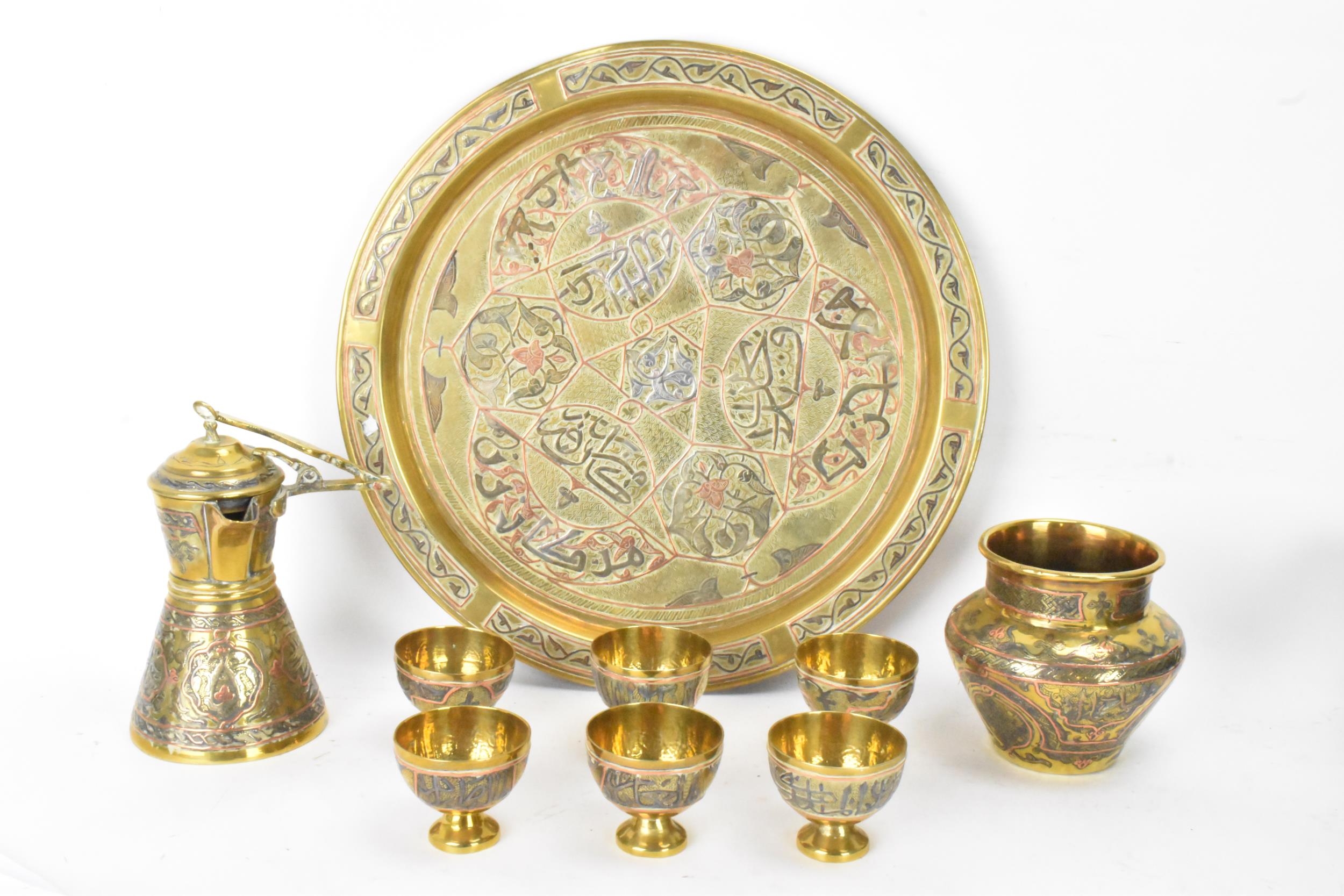 A 19th century Islamic Cairoware mamluk revival brass coffee/tea service, consisting of a tray 31.