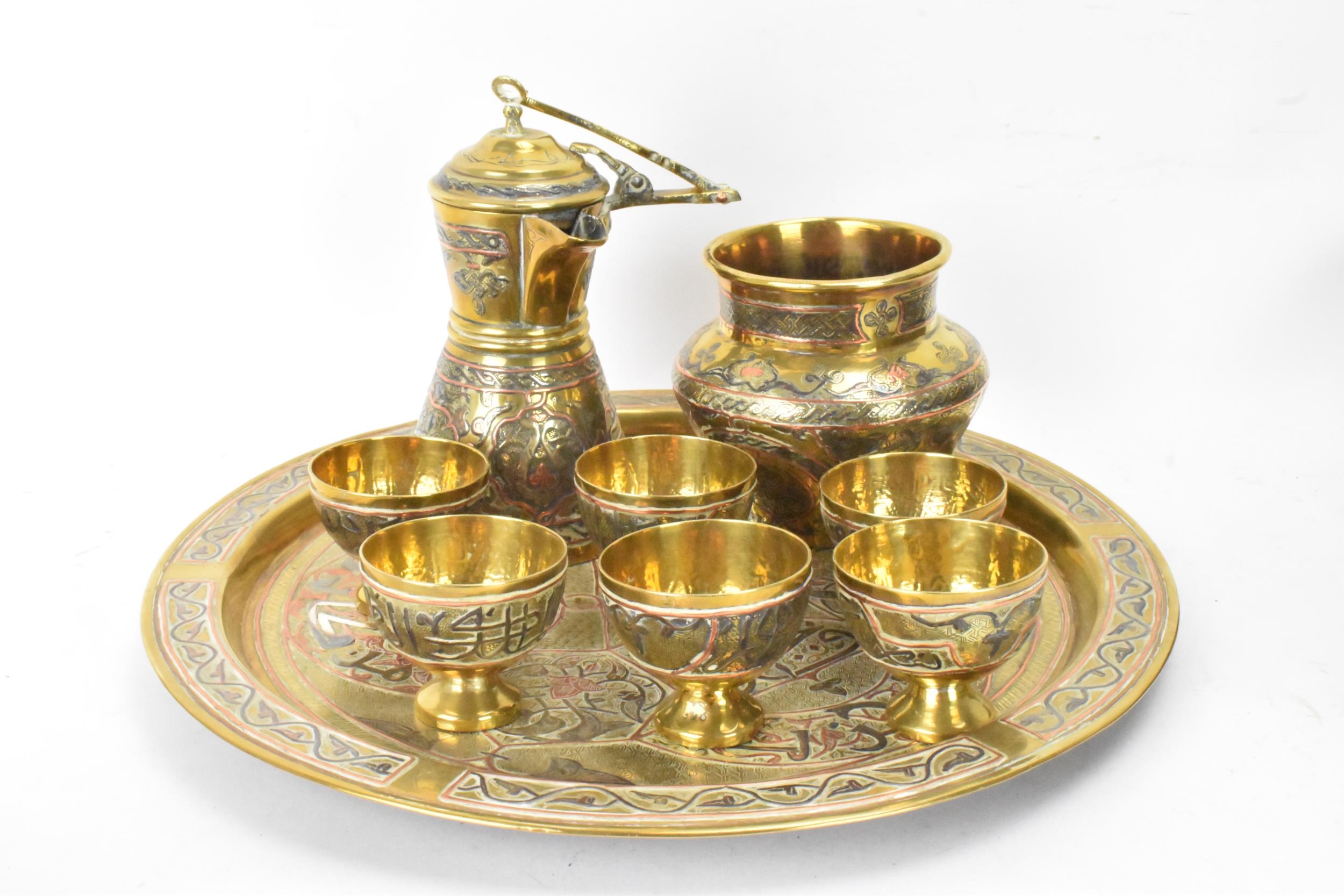 A 19th century Islamic Cairoware mamluk revival brass coffee/tea service, consisting of a tray 31. - Image 12 of 12