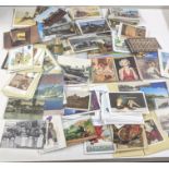A collection of a variety of postcards to include Marilyn Monroe, train related postcards and others