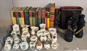 A mixed lot to include a pair of vintage binoculars with case, a collection of books to include '