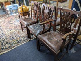 A set of six early 20th century Chippendale style dining chairs with overstuffed upholstered seats