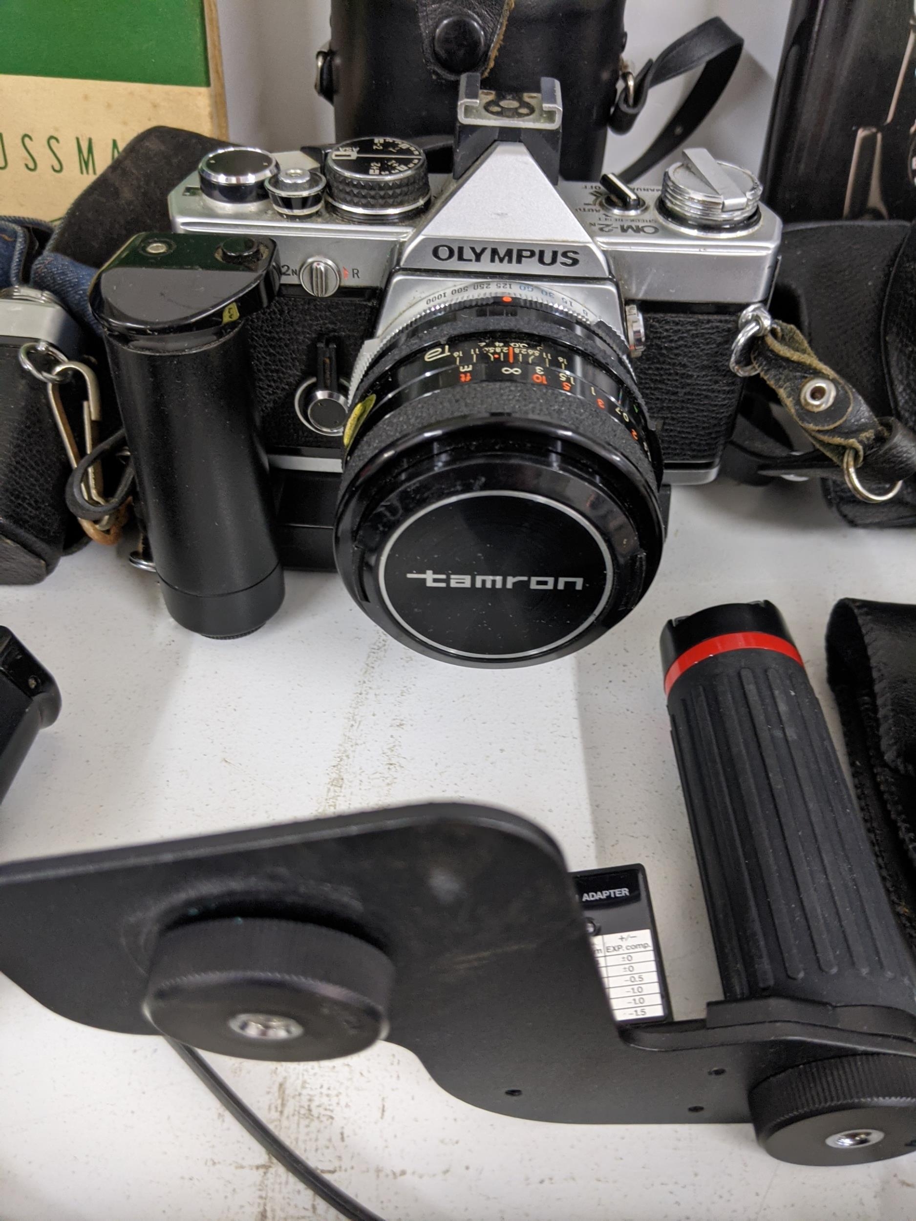 Olympus cameras, equipment and photography accessories to include two Olympus OM-2s, an Olympus OM- - Image 6 of 10