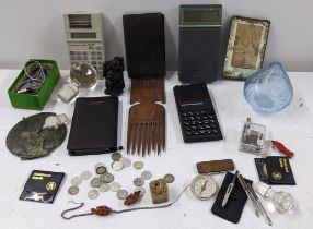 A mixed lot to include two Japanese carved netsukes, threepence coins and other items Location: If