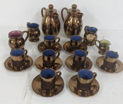 Creigau pottery to include two tea pots, two three milk jugs a cream jug, 8 tea cups and saucers