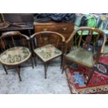 Three late 19th/early 20th century chairs to include a corner chair, and a similar corner chair, and